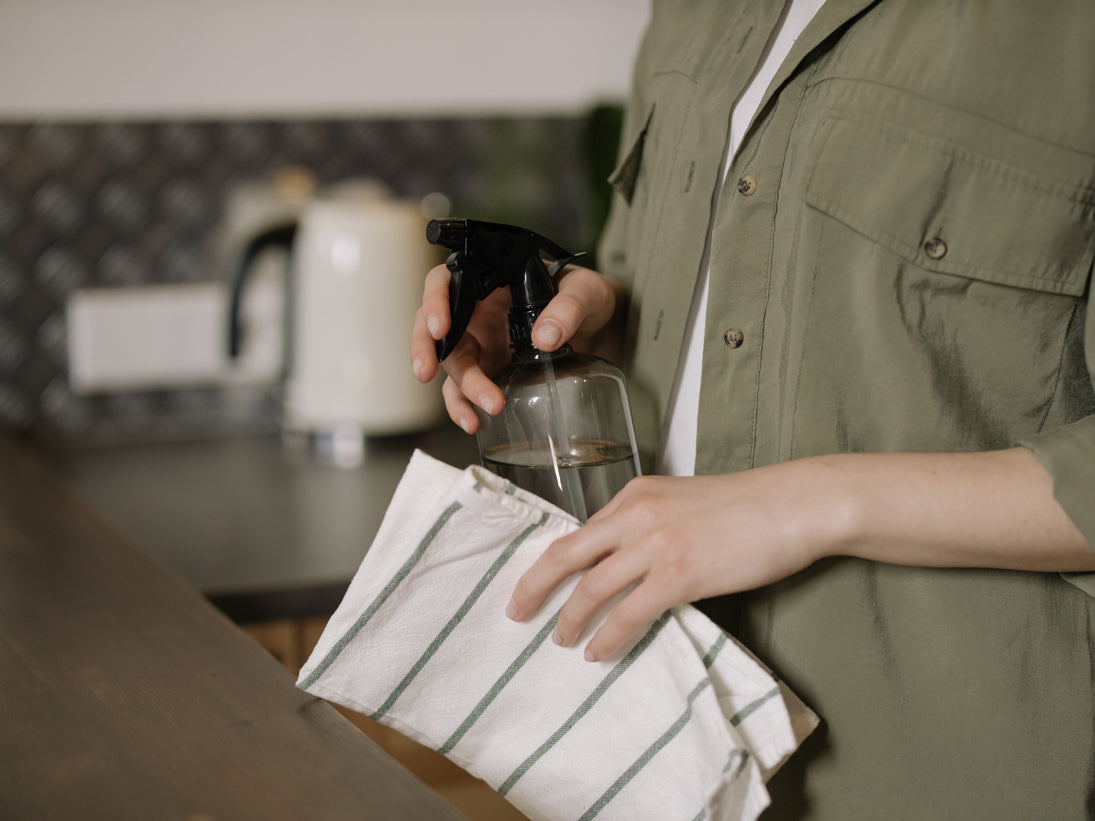 Photo by cottonbro: https://www.pexels.com/photo/person-in-green-button-up-shirt-holding-clear-drinking-glass-4108712/